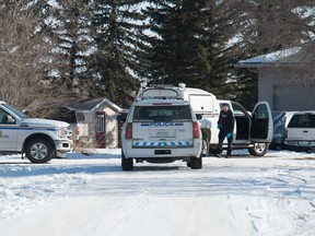 RCMP officers on scene at a rural property just northeast of Regina, Saskatchewan on Feb. 20, 2020.