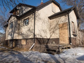 A home sits boarded up in Regina, Saskatchewan on Feb. 21, 2020.