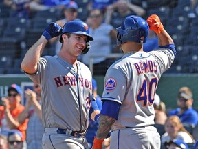 The New York Mets' Pete Alonso, left, celebrates one of the 52 home runs he hit during a phenomenal rookie season in 2019.