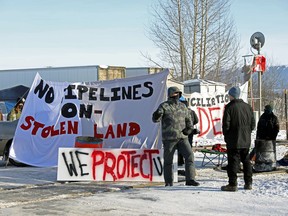 Supporters of the indigenous Wet'suwet'en Nation's hereditary chiefs camp at a railway blockade as part of protests against British Columbia's Coastal GasLink pipeline, in Edmonton, Alberta, Canada February 19,
