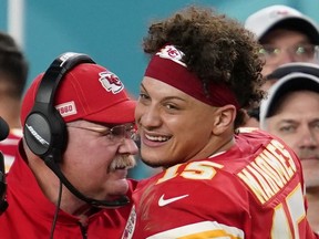 Kansas City Chiefs' Patrick Mahomes and head coach Andy Reid celebrate during the game. (REUTERS/Mike Blake)