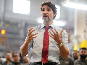 Prime Minister Justin Trudeau takes questions from the media as he visits auto parts company ABC Technologies to talk about the USMCA trade agreement, in Brampton, Ont., on Thursday, Jan. 30, 2020.