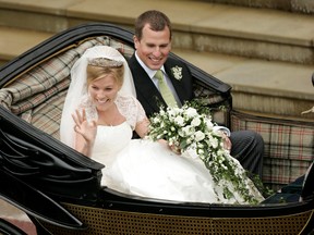 Britain's Peter Phillips and Canada's Autumn Kelly leave St George's Chapel after their marriage in Windsor, southern England on May 17, 2008.