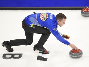 Team Alberta skip Brendan Bottcher delivers as they take on Team Saskatchewan during the championship pool at the Brier in Kingston, Ont., on Thursday, March 5, 2020.