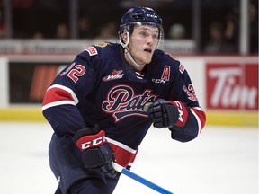 Former Regina Pats forward Robbie Holmes has signed a one-year deal with the ECHL's Kansas City Mavericks.