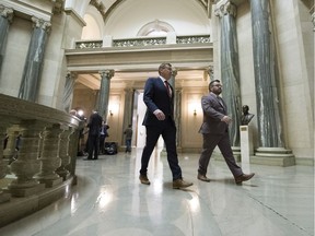 Premier Scott Moe walks back to his office after speaking with reporters after the opening of a new session at the Legislative Building on March 2, 2020.