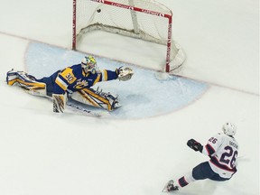 The Regina Pats' Jakob Brook (26) rips a shot past Saskatoon Blades goalie Koen MacInnes during WHL action at the Brandt Centre on Saturday.