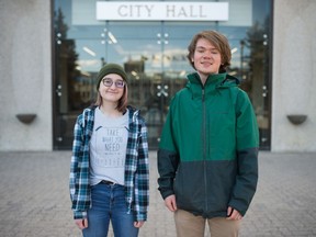 Sydney Taylor Chadwick, left, and Mac Findlay of Fridays for Future Regina stand outside City Hall in Regina, Saskatchewan on Mar. 10, 2020.