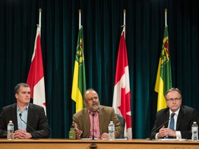 From left, John Ash, SHA Executive Director of Acute Care, Saskatchewan's Chief Medical Health Officer Dr. Saqib Shahab, and  Saskatchewan Health Minister Jim Reiter speak to media during a news conference regarding Novel Coronavirus (COVID-19) at the Saskatchewan Legislative Building in Regina, Saskatchewan on Mar 11, 2020.