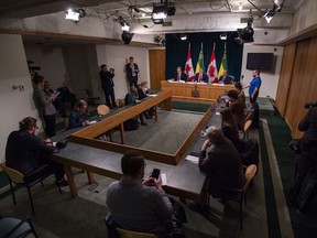 Saskatchewan Premier Scott Moe, along with Saskatchewan Health Minister Jim Reiter and Saskatchewan's Chief Medical Health Officer Dr. Saqib Shahab, speaks to reporters at a media conference regarding the province's response to COVID-19 at the Saskatchewan Legislative Building in Regina, Saskatchewan on Mar. 18, 2020.  BRANDON HARDER/ Regina Leader-Post