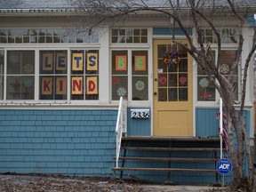 REGINA, SASK : March 24, 2020  -- A home in Regina's Heritage neighbourhood wears a message in its windows during the COVID-19 pandemic in Regina, Saskatchewan on March 24, 2020. BRANDON HARDER/ Regina Leader-Post