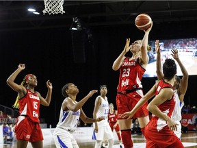 Regina-born Team Canada basketball player Quinn Dornstauder, 23, goes up for a shot against the Dominican Republic during an Olympic women's pre-qualifying tournament in Edmonton on Nov. 17.