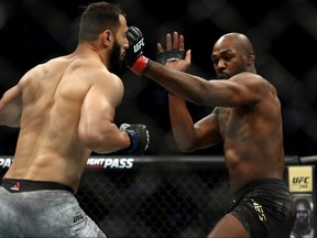Dominick Reyes (left) and Jon Jones square off in their UFC championship bout during UFC 247 at Toyota Center on February 8, 2020 in Houston. (Ronald Martinez/Getty Images)