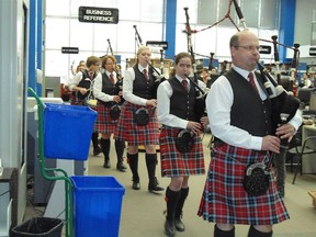 The City of Regina Pipe Band, pictured performing at the Regina Public Library. The group typically tours various venues on St. Patrick's Day, but has called off its 2020 gigs due to COVID-19 concerns.