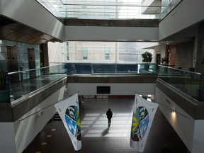 A woman walks through a nearly-deserted RIC building in the University of Regina in Regina, Saskatchewan on Mar 14, 2020. The school has indicated that it will stop classes on campus due to fear around COVID-19.
BRANDON HARDER/ Regina Leader-Post