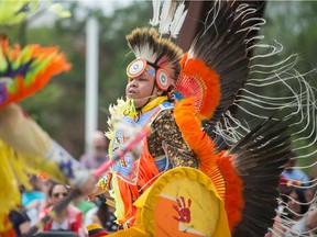 Teddy Bison dances in City Square Plaza during a National Indigenous Peoples Day event in June 2018.