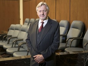 Court of Queen's Bench Chief Justice Martel Popescul stands near a Regina jury box, pre-COVID-19. TROY FLEECE / Regina Leader-Post