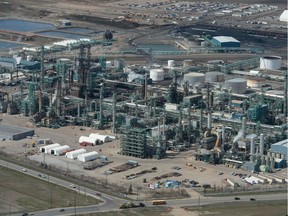 An aerial photo shows the Co-Op Refinery Complex.