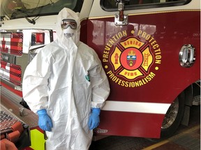 A member of Regina Fire & Protective Services wears PPE (Personal Protective Equipment), which firefighters are equipped with in case they need to respond to a contaminated scene during the COVID-19 pandemic. (Photo courtesy Regina Fire & Protective Services).