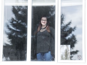 Laura Blattner, assistant program coordinator with John Howard Society, stands inside a group home in Regina on Wednesday, April 8, 2020.