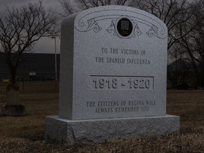 A monument to the victims of the Spanish Flu stands in a cemetery in Regina.