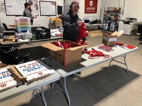 A Local 594 member gets ready for Wednesday¹s rally scheduled for 10:00 a.m. through Wascana Park and past the Legislative Building. Local 594 President Kevin Bittman says he anticipates some 400 members to show up.