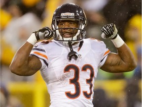 Running back Jeremy Langford, shown after scoring a touchdown for the Chicago Bears in 2015, has signed with the Saskatchewan Roughriders.