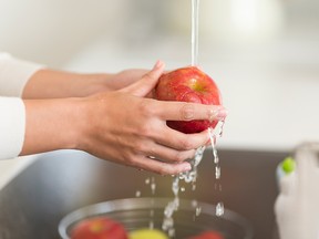 Just as you would in non-pandemic times, using cold running water to wash fresh fruits and vegetables before eating “should be more than sufficient.”