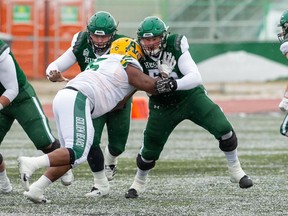 University of Saskatchewan Huskies offensive lineman Mattland Riley, right, could be a first-round selection in Thursday's CFL draft.
