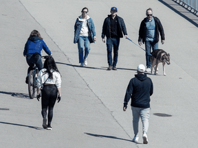 Cyclists, joggers and walkers on Toronto's Lake Shore Boulevard during the COVID-19 pandemic.