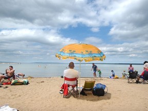 Vacationers at Waskesiu's beach front in the Prince Albert National Park. Star Phoenix photo by Peter Wilson