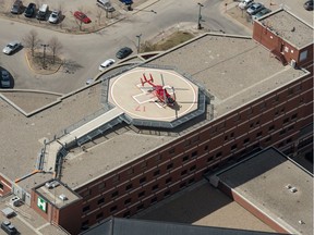 An aerial photo shows a STARS helicopter sitting on the roof of the Regina General Hospital.