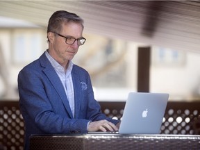 Ken Christoffel, president/CEO of Brown Communications Group, works from his home in Regina on Thursday, May 7, 2020.