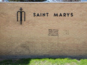A blank space can be seen on the wall where a bronze plaque used to hang before it was stolen at Saint Mary's Roman Catholic church in Regina, Saskatchewan on May 7, 2020.