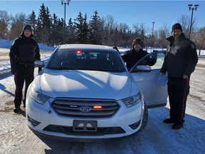 Left to right, constables Rene Eklund (Regina Police Service), Erin Anthony (Saskatoon Police Service) and Graham Borne (Saskatchewan Police College/RPS) during traffic stop scenario training at Saskatchewan Police College in Regina prior to COVID-19 restrictions.