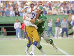 Saskatchewan Roughriders rush end Bobby Jurasin, shown hitting Winnipeg Blue Bombers quarterback Tom Clements in 1987, is the Green and White's all-time sacks leader.