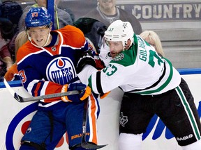 CP-Web. Dallas Stars Alex Goligoski (33) checks Edmonton Oilers Ales Hemsky (83) during second period NHL hockey action in Edmonton, Alta., on Wednesday November 13, 2013. The Ottawa Senators picked up Hemsky Wednesday in exchange for a third-round pick in this year's draft and a fifth-rounder in 2015. THE CANADIAN PRESS/Jason Franson ORG XMIT: CPT113