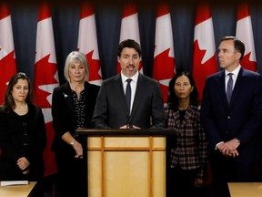 Canada's Prime Minister Justin Trudeau, with Deputy Prime Minister Chrystia Freeland, left, Minister of Health Patty Hajdu, Chief Public Health Officer Dr. Theresa Tam and Minister of Finance Bill Morneau, at a news conference in Ottawa on March 11, 2020.