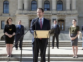 NDP Leader Ryan Meili addresses the media on the front steps of the Saskatchewan Legislative Building on May 21, 2020, calling on Premier Scott Moe to reopen the legislature to MLAs.