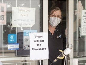 Natash Brewster is manager at Money Express Pawn. The shop has moved to a drop off system where customers communicate with staff via a microphone.