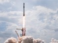 The SpaceX Falcon 9 rocket with the manned Crew Dragon spacecraft attached takes off from launch pad 39A at the Kennedy Space Center in Cape Canaveral, Fla., Saturday, May 30, 2020.