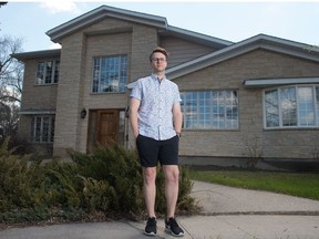 Kent Peterson stands in front of a home owned by the University of Regina in Regina, Saskatchewan on May 14, 2020. The home has been provided by the university for its president to live in, but now the school is selling the house -- something Peterson has long advocated for.