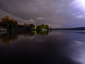 A late night summer lightning storm rolls across the sky on Pasqua Lake in the Qu'Appelle valley north east of Regina August 7, 2014.