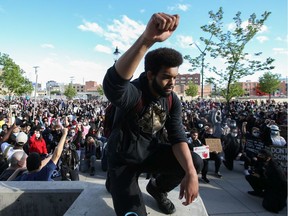 Black Lives Matter Saskatoon march organizer Braydon Page knelt down for a moment of silence in front of the Saskatoon Police Service Headquarters along with thousands who rallied together last month to honour George Floyd