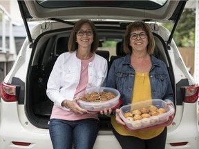 Sisters Darlene Hillis, left, and Lorie Matthewson have been baking muffins and collecting muffins from their friends and family to donate to Carmichael Outreach and several school lunch programs in Regina.