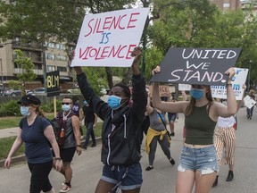 Marchers in support of Black Lives Matter walk 24th Street East in Saskatoon, SK on June 13, 2020. LIAM RICHARDS / Saskatoon StarPhoenix