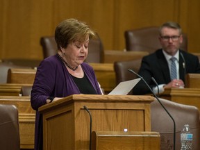 Saskatchewan Finance Minister Donna Harpauer stands to deliver the budget speech in the chamber at the Saskatchewan Legislative Building in Regina, Saskatchewan on June 15, 2020.