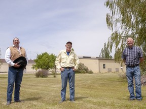 Howard Adams, Gord Howe and Bruce Neill practice safe social distancing while posing for a photo on the former site of the Agroforestry Development Centre near Indian Head, Sask. on June 12, 2020. Howe and Neill were both managers at the 640-acre site until the government closed it in 2012. Adams is the site's property manager, representing its new owner, Carry the Kettle Nakoda Nation. Evan Radford/Regina Leader-Post