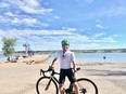 Brett Vancise is shown on Tuesday at Regina Beach, where five days earlier he had cycled up Regina Beach hill 243 times to reach a total climb that was equivalent to the elevation of Mount Everest.