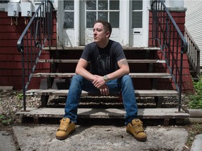 Zach Gessner, who will be among a group of four graduates of Regina Drug Treatment Court, sits on the steps of his home in Regina, Saskatchewan on June 16, 2020.